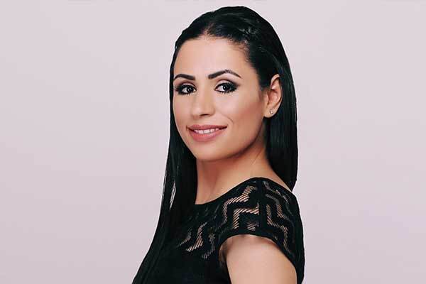 Female Jordanian voice-over talent in studio.